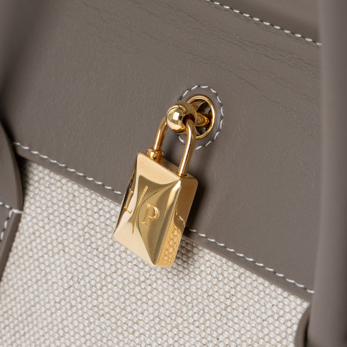 Shop this authentic Loro Piana Natural/Almond Tree Canvas Loom L25 Bag pre-loved on labellov.com