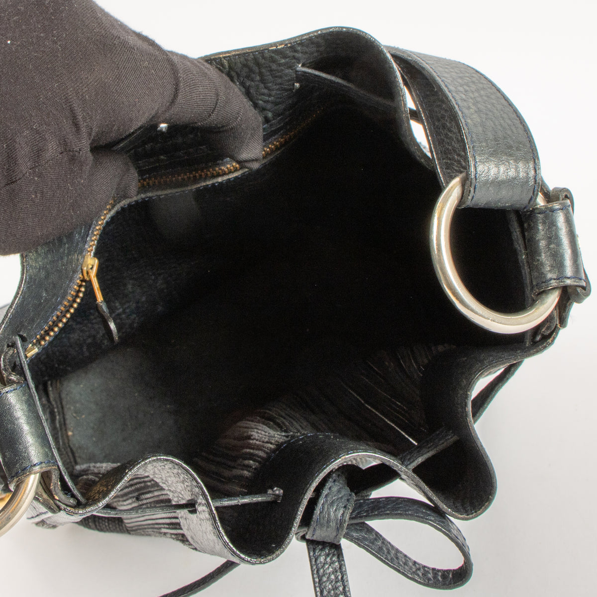 Shop this authentic Delvaux Blue Toile de Cuir Gibus Bucket Bag pre-loved on Labellov.com