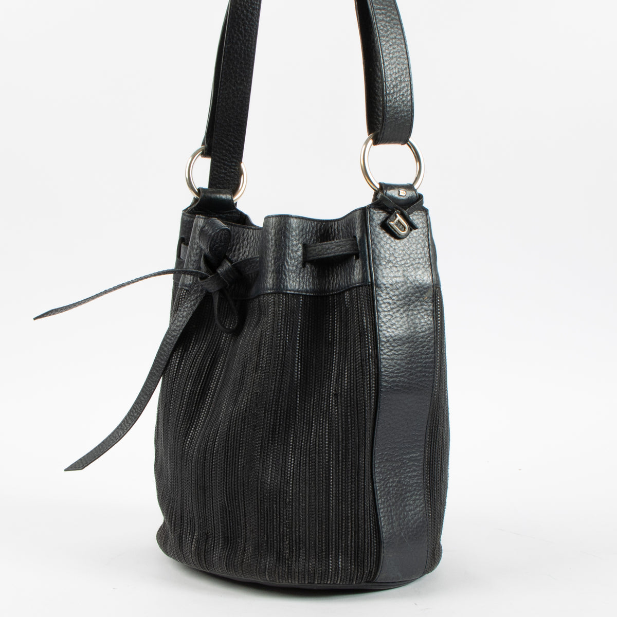 Shop this authentic Delvaux Blue Toile de Cuir Gibus Bucket Bag pre-loved on Labellov.com
