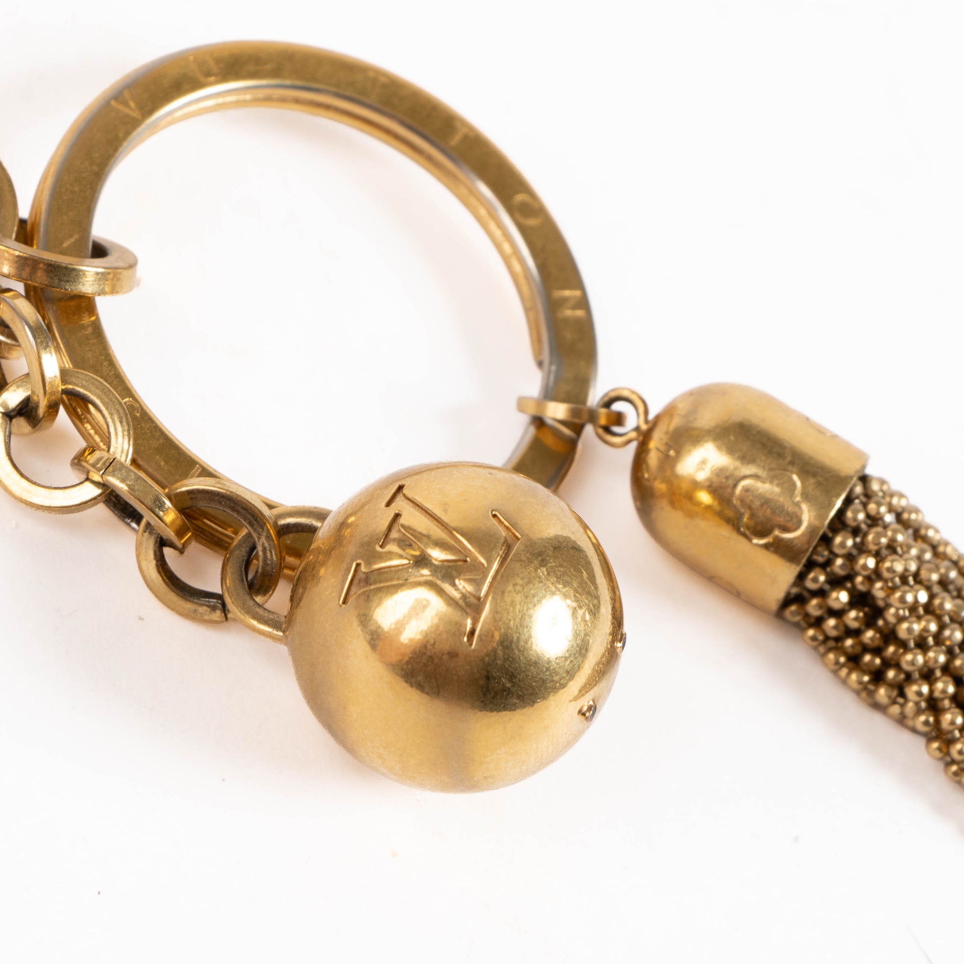 Louis Vuitton Gold-plated metal Porte Cles Swing Tassel Charm