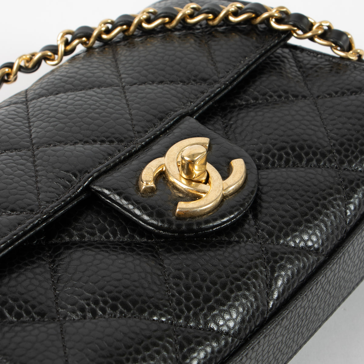 Shop this authentic Chanel 26C Black Caviar Mini Flap Bag pre-loved on Labellov.com