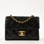 Shop this authentic Chanel 26C Black Caviar Mini Flap Bag pre-loved on Labellov.com