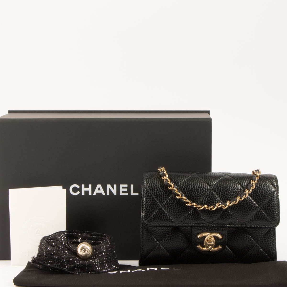 Shop this authentic Chanel 26C Black Caviar Mini Flap Bag pre-loved on Labellov.com
