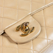 Shop this authentic Chanel Vintage Beige Lambskin Medium Classic bag pre-loved on Labellov.com