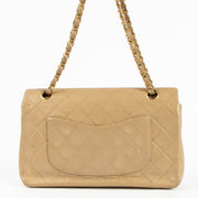 Shop this authentic Chanel Vintage Beige Lambskin Medium Classic bag pre-loved on Labellov.com