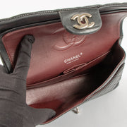 Shop authentic Chanel Black Lambskin Medium Classic 11.12 Handbag on Labellov.com.