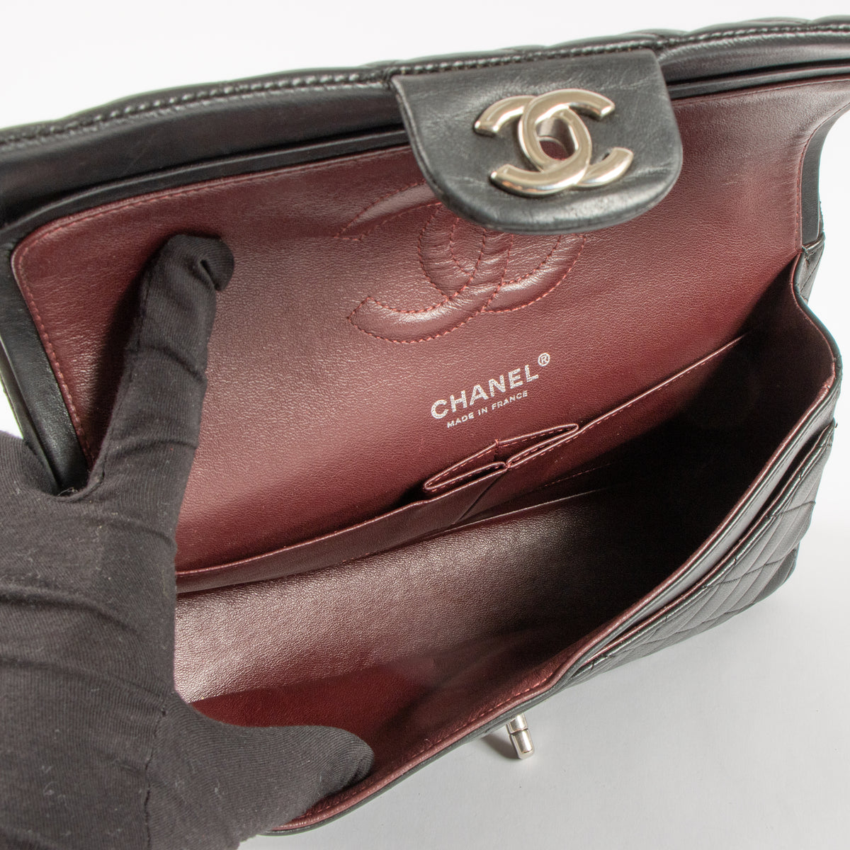 Shop authentic Chanel Black Lambskin Medium Classic 11.12 Handbag on Labellov.com.