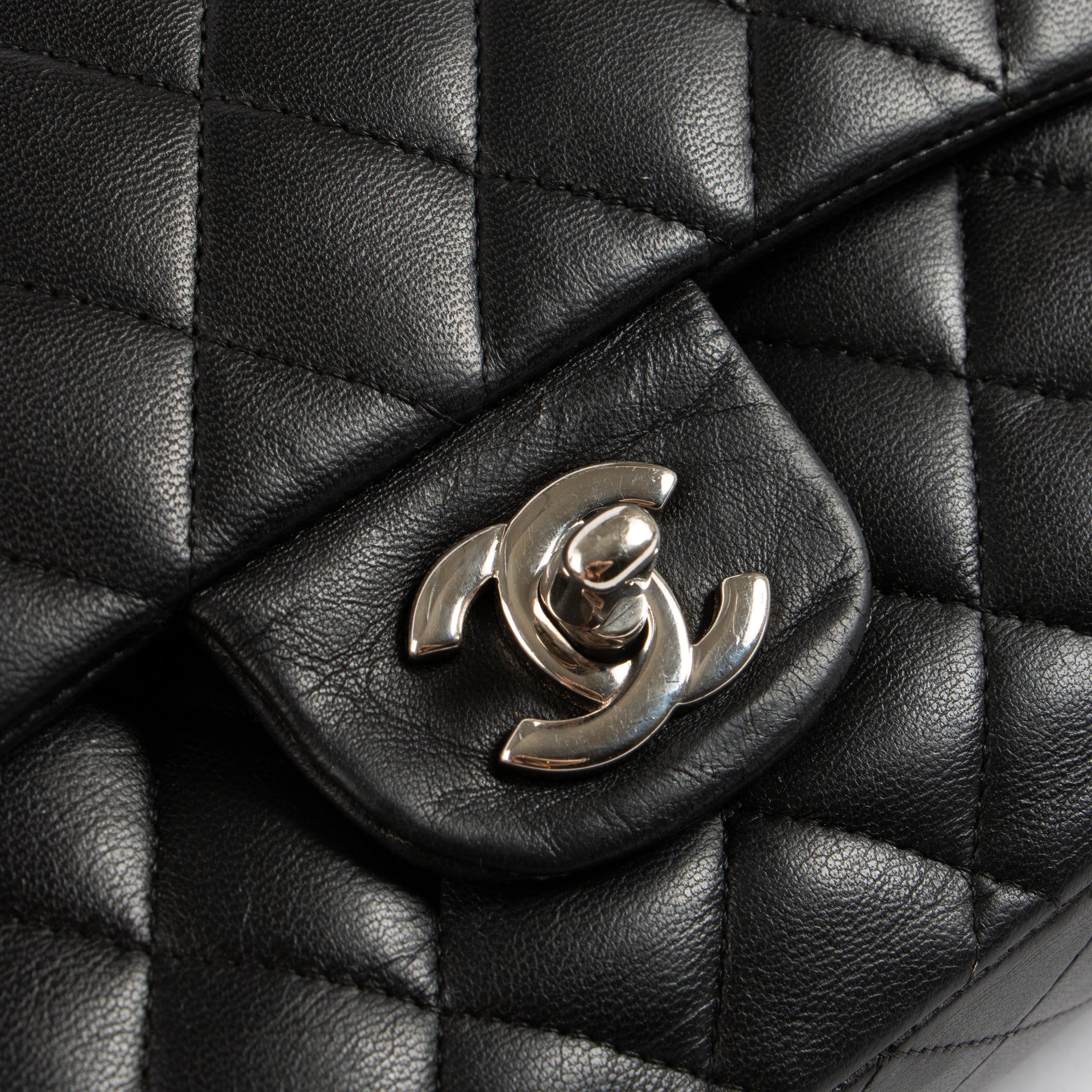 Shop authentic Chanel Black Lambskin Medium Classic 11.12 Handbag on Labellov.com.