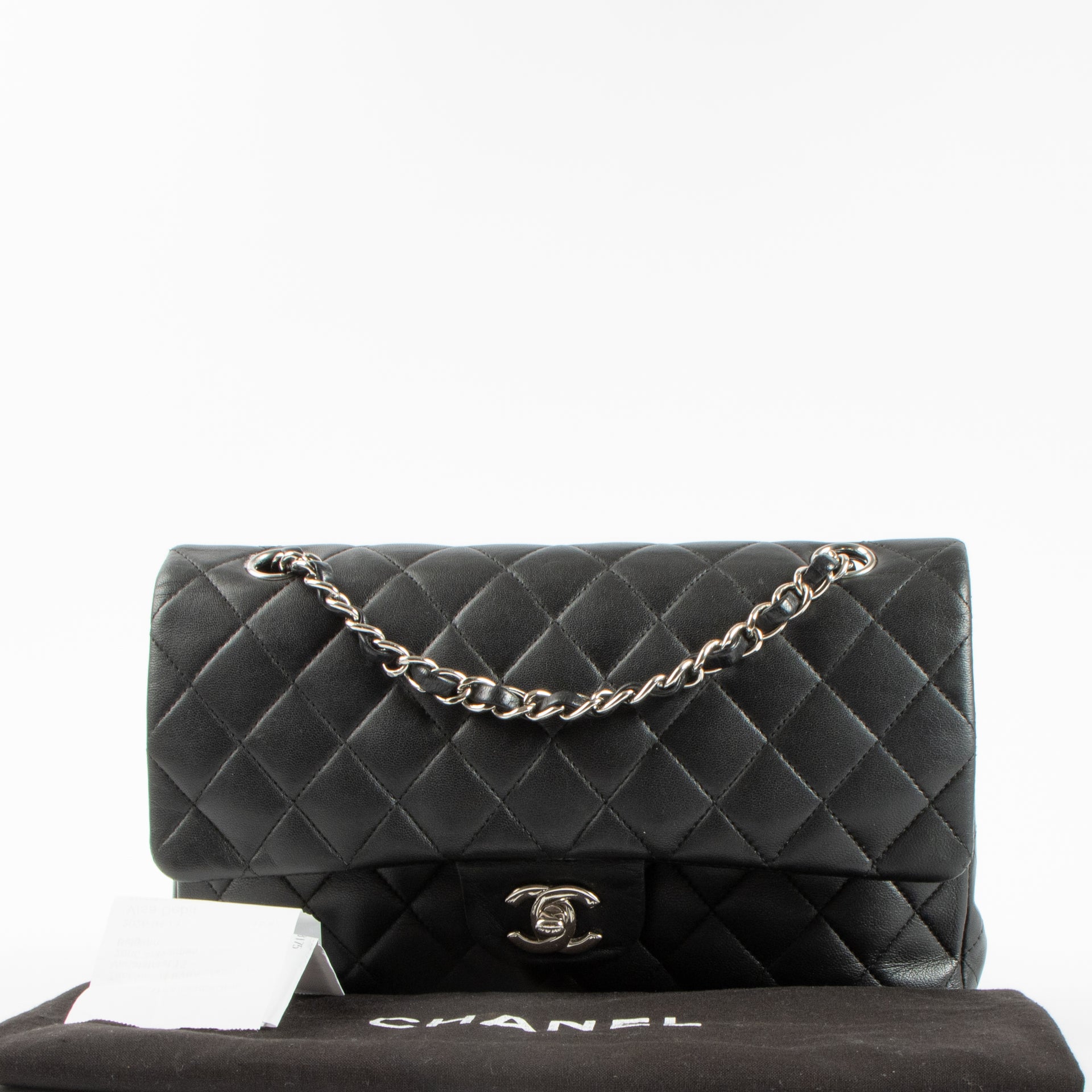 Shop authentic Chanel Black Lambskin Medium Classic 11.12 Handbag on Labellov.com.