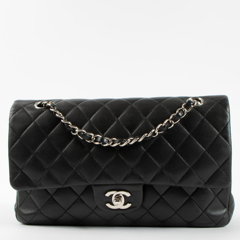 Shop authentic Chanel Black Lambskin Medium Classic 11.12 Handbag on Labellov.com.
