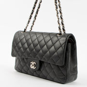 Shop authentic Chanel Black Lambskin Medium Classic 11.12 Handbag on Labellov.com.