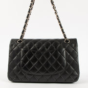 Shop authentic Chanel Black Lambskin Medium Classic 11.12 Handbag on Labellov.com.