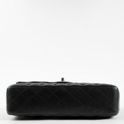 Shop authentic Chanel Black Lambskin Medium Classic 11.12 Handbag on Labellov.com.