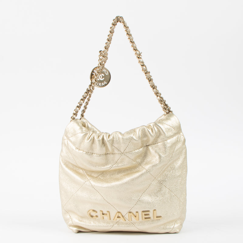 Shop this authentic Chanel Gold Lambskin Chanel 22 Mini Bag pre-loved on Labellov.com