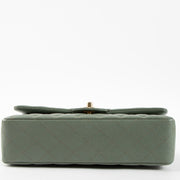 Shop this authentic luxury Chanel Green Caviar Medium Classic 11.12 bag Pre-Loved on Labellov.com