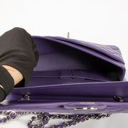Shop this authentic Chanel Purple Lambskin Medium Classic 11.12 Handbag pre-loved on Labellov.com
