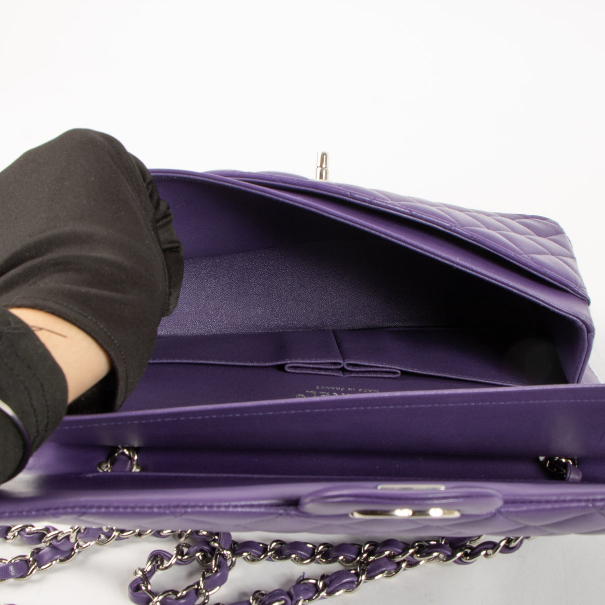 Shop this authentic Chanel Purple Lambskin Medium Classic 11.12 Handbag pre-loved on Labellov.com