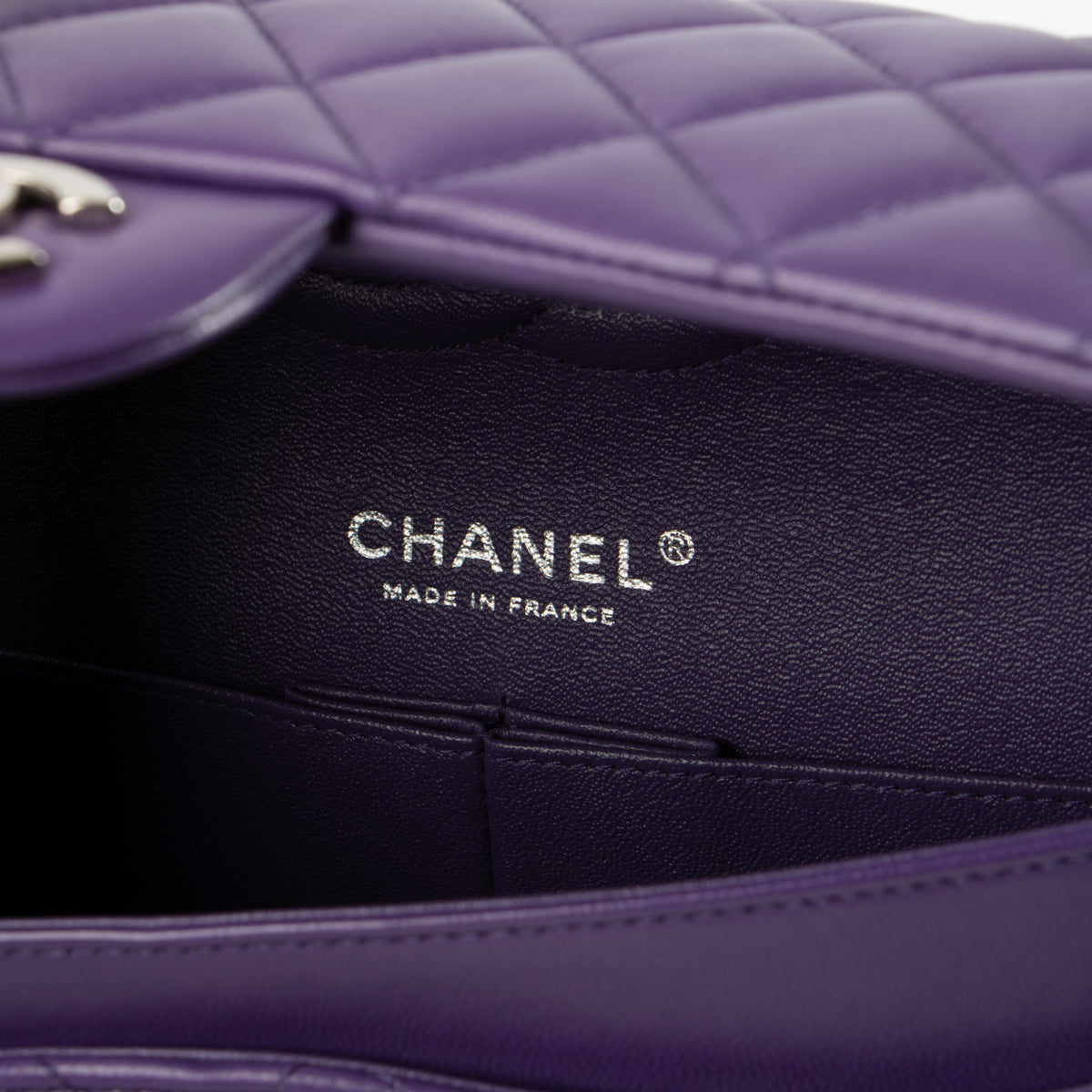 Shop this authentic Chanel Purple Lambskin Medium Classic 11.12 Handbag pre-loved on Labellov.com