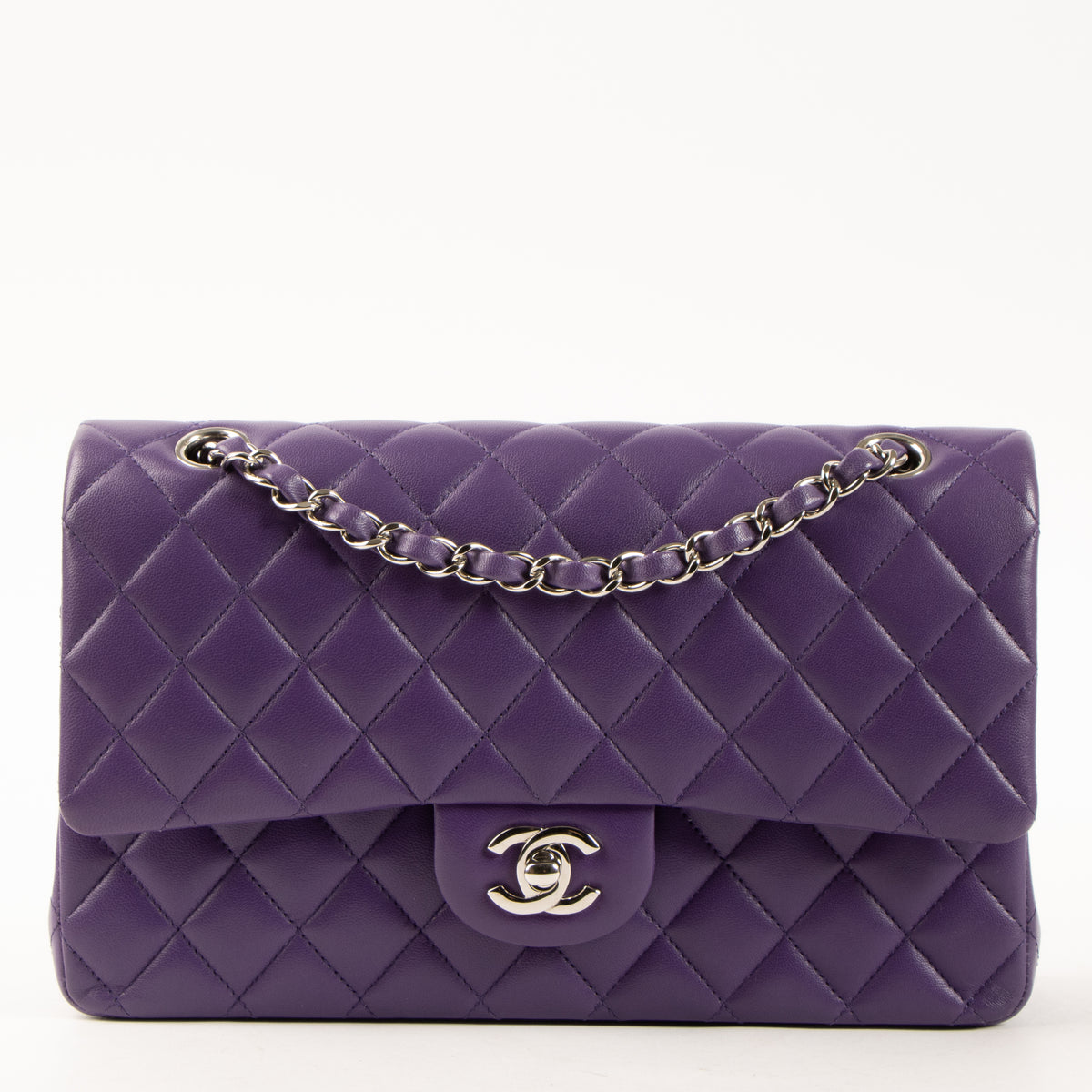 Shop this authentic Chanel Purple Lambskin Medium Classic 11.12 Handbag pre-loved on Labellov.com