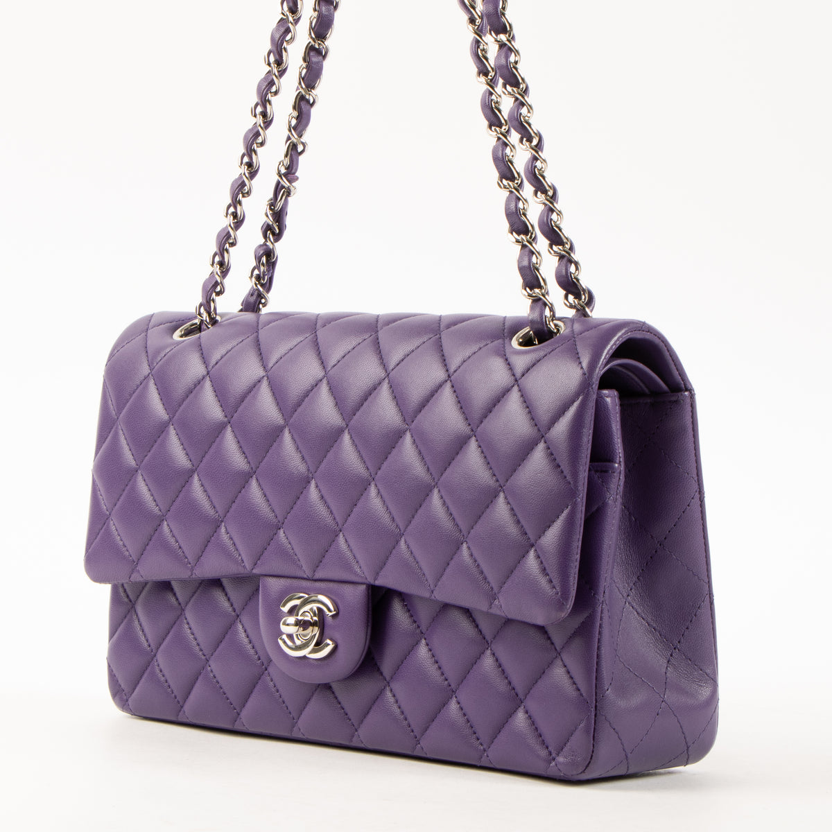 Shop this authentic Chanel Purple Lambskin Medium Classic 11.12 Handbag pre-loved on Labellov.com