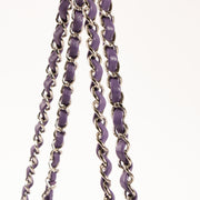 Shop this authentic Chanel Purple Lambskin Medium Classic 11.12 Handbag pre-loved on Labellov.com