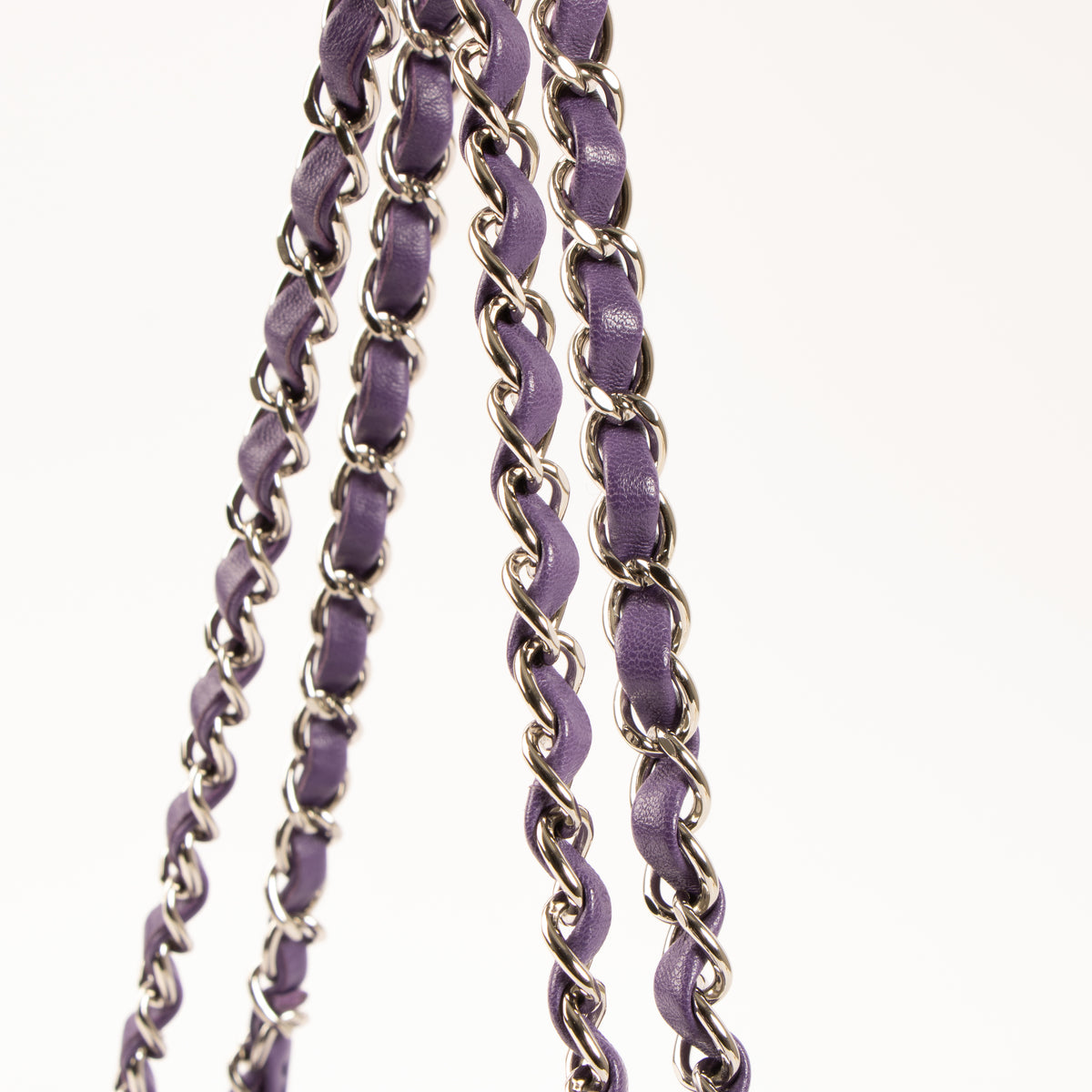 Shop this authentic Chanel Purple Lambskin Medium Classic 11.12 Handbag pre-loved on Labellov.com