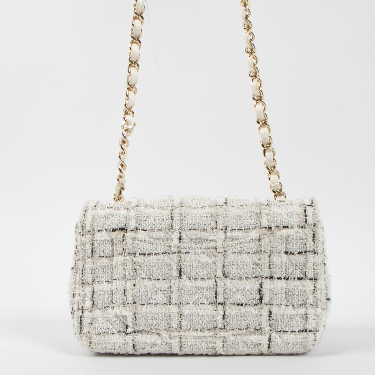 Shop the authentic Chanel Tweed Mini Classic Handbag second hand on Labellov.com!