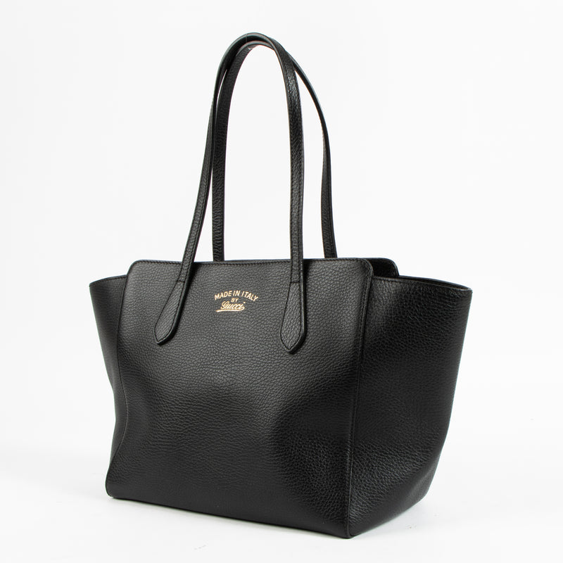 Shop the authentic Gucci Black Leather Medium Swing Bag on Labellov.com !