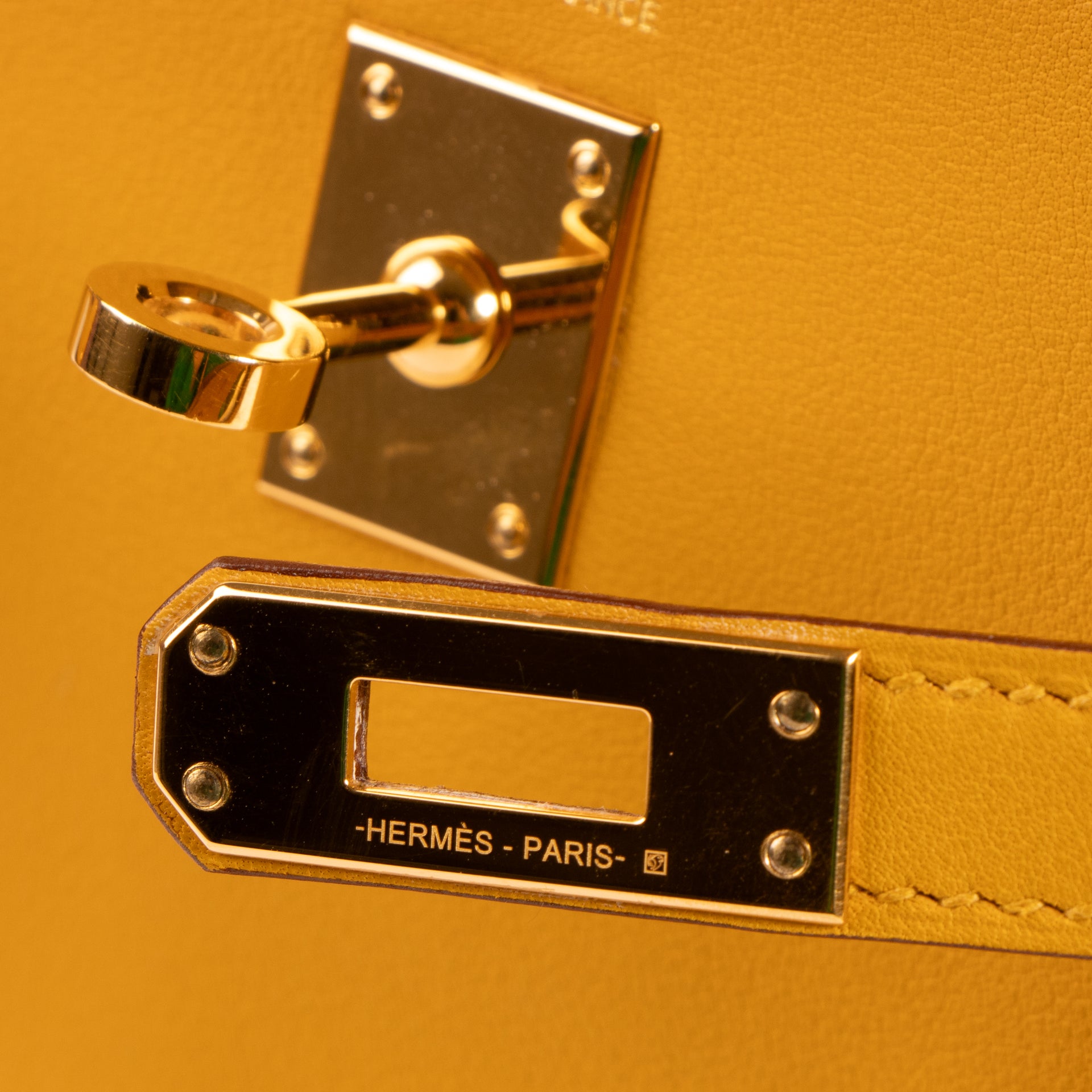 Hermès Kelly 25 Jaune Ambre Swift GHW