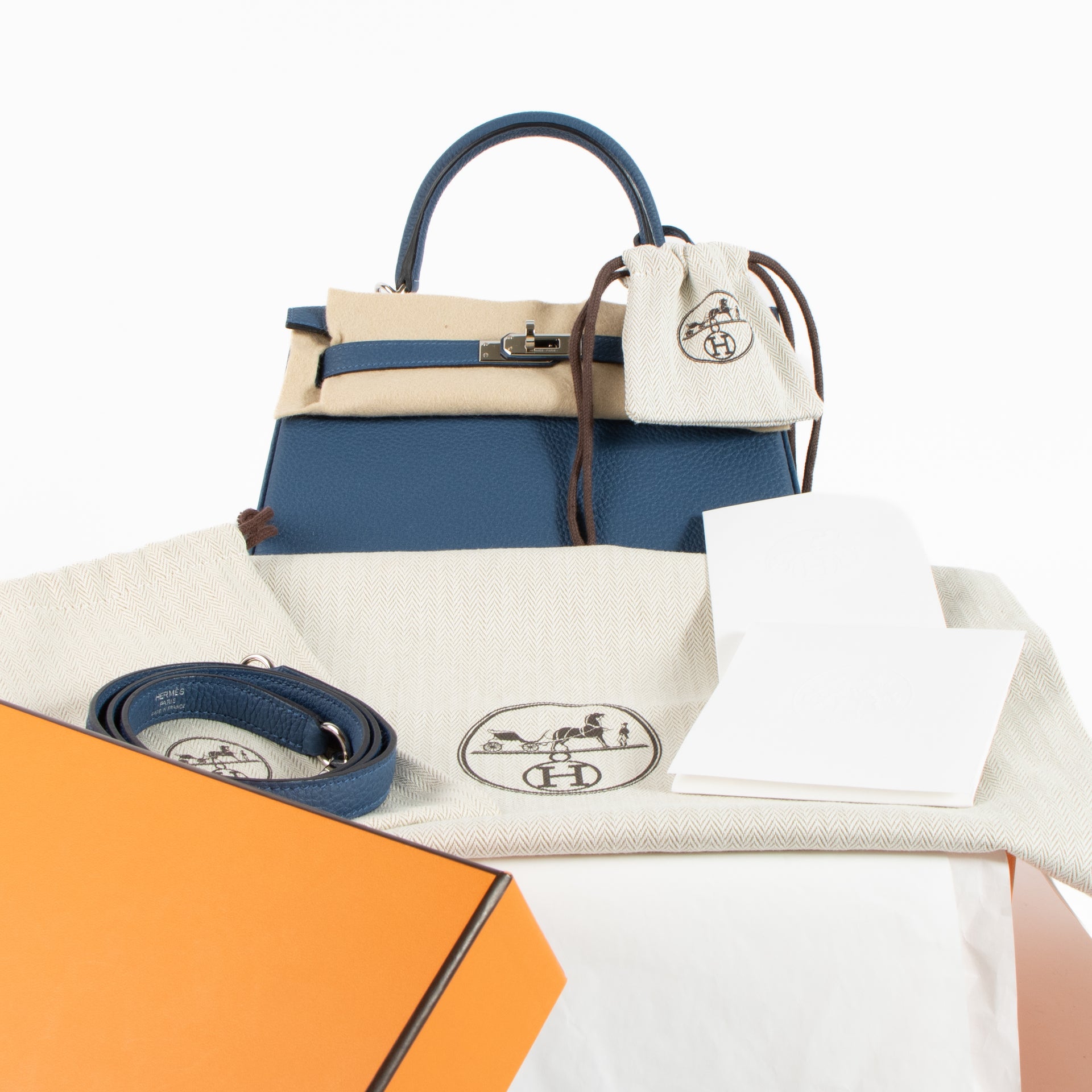 Hermès Kelly 25 Bleu Tie Togo PHW