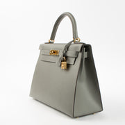 Shop this authentic Hermes Kelly 28 Gris Meyer Madame GHW pre-loved on Labellov.com