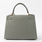 Shop this authentic Hermes Kelly 28 Gris Meyer Madame GHW pre-loved on Labellov.com