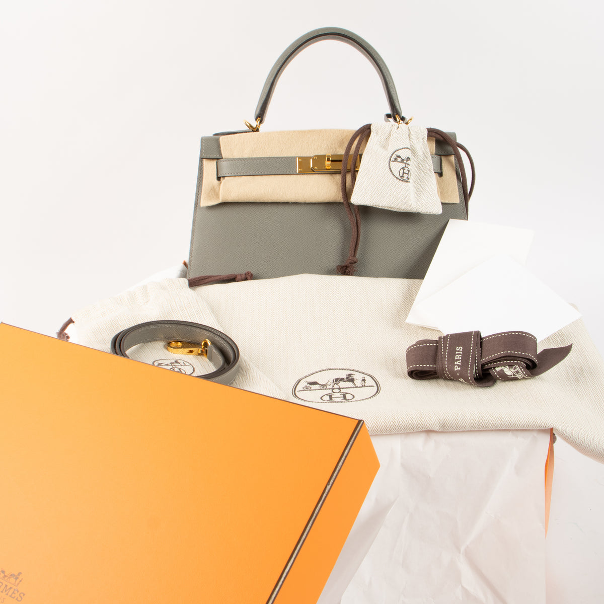 Shop this authentic Hermes Kelly 28 Gris Meyer Madame GHW pre-loved on Labellov.com