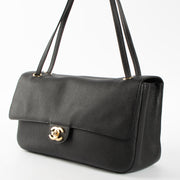 Shop this authentic Chanel 26S Black Grained Calfskin Souplissimo Maxi Flap pre-loved on Labellov.com