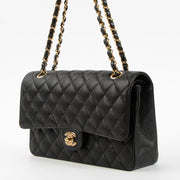 Shop this authentic luxury Chanel Black Caviar Classic 11.12 Handbag Pre-Loved on Labellov.com