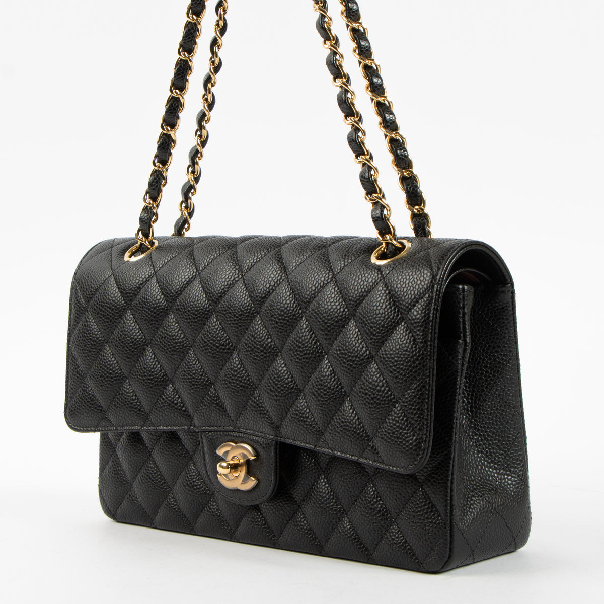 Shop this authentic luxury Chanel Black Caviar Classic 11.12 Handbag Pre-Loved on Labellov.com