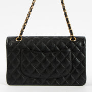 Shop this authentic luxury Chanel Black Caviar Classic 11.12 Handbag Pre-Loved on Labellov.com