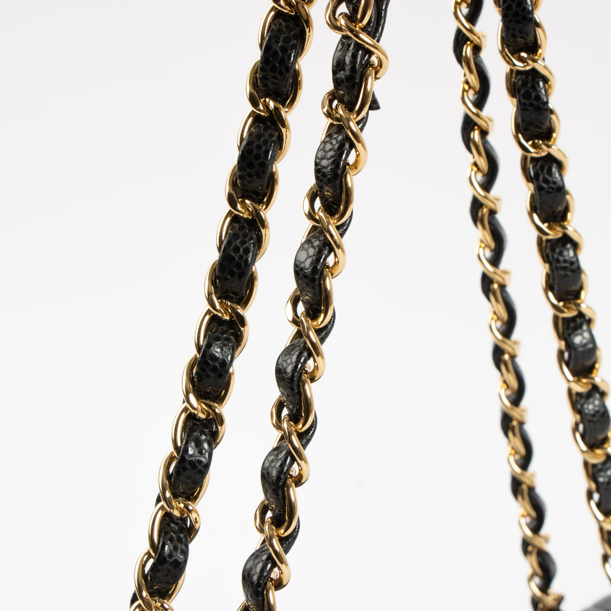 Shop this authentic luxury Chanel Black Caviar Classic 11.12 Handbag Pre-Loved on Labellov.com