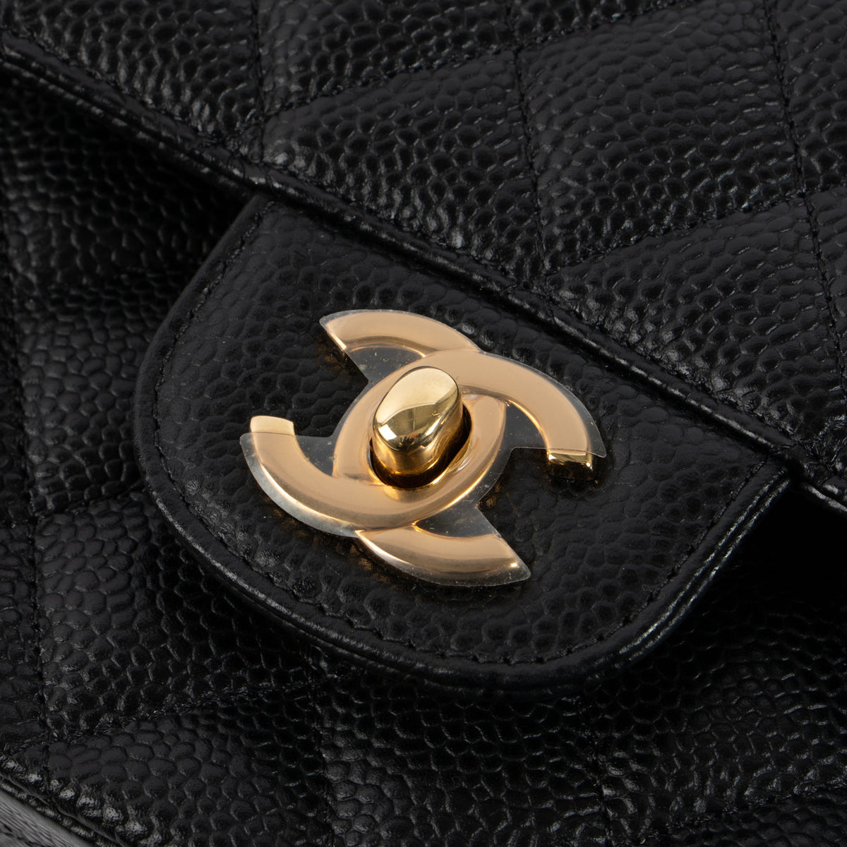 Shop this authentic luxury Chanel Black Caviar Classic 11.12 Handbag Pre-Loved on Labellov.com