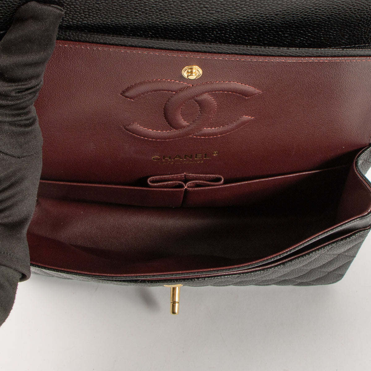 Shop this authentic luxury Chanel Black Caviar Classic 11.12 Handbag Pre-Loved on Labellov.com