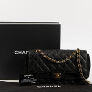 Shop this authentic luxury Chanel Black Caviar Classic 11.12 Handbag Pre-Loved on Labellov.com