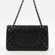 Shop the authentic Chanel Black Caviar Medium Classic 11.12 Handbag on Labellov.com.