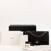 Shop the authentic Chanel Black Caviar Medium Classic 11.12 Handbag on Labellov.com.