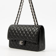 Shop the authentic Chanel Black Caviar Medium Classic 11.12 Handbag on Labellov.com.