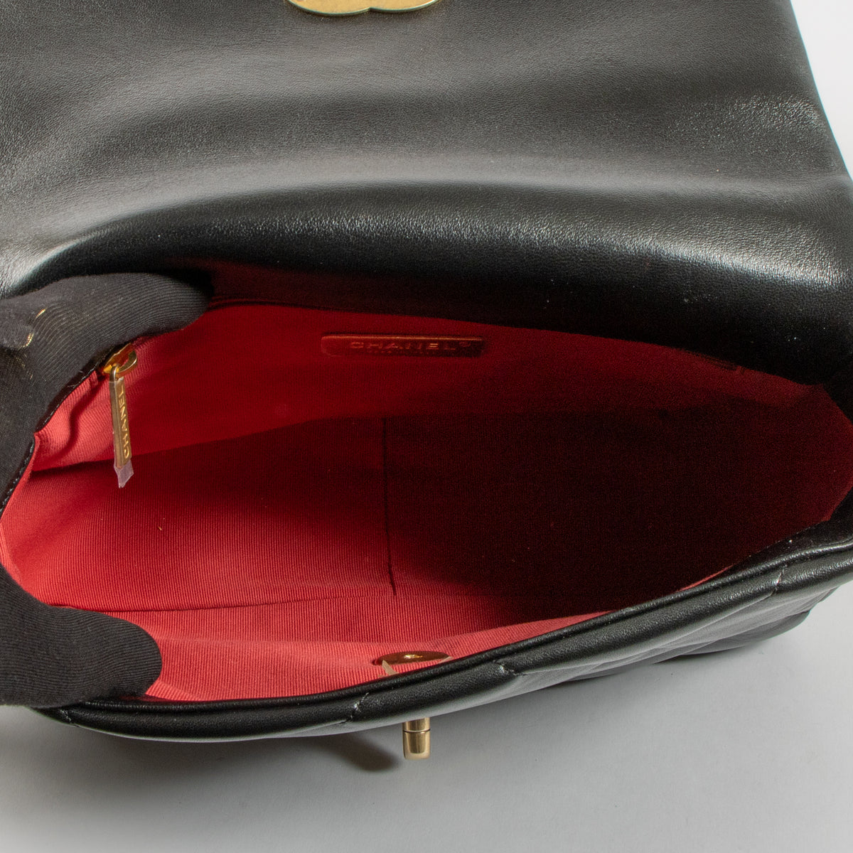Shop the authentic Chanel Black Lambskin Small Chanel 19 Bag second hand on Labellov.com!