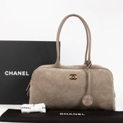 Shop the authentic Chanel 26S Grey Suede Large Perfect Bowling Bag on Labellov.com !