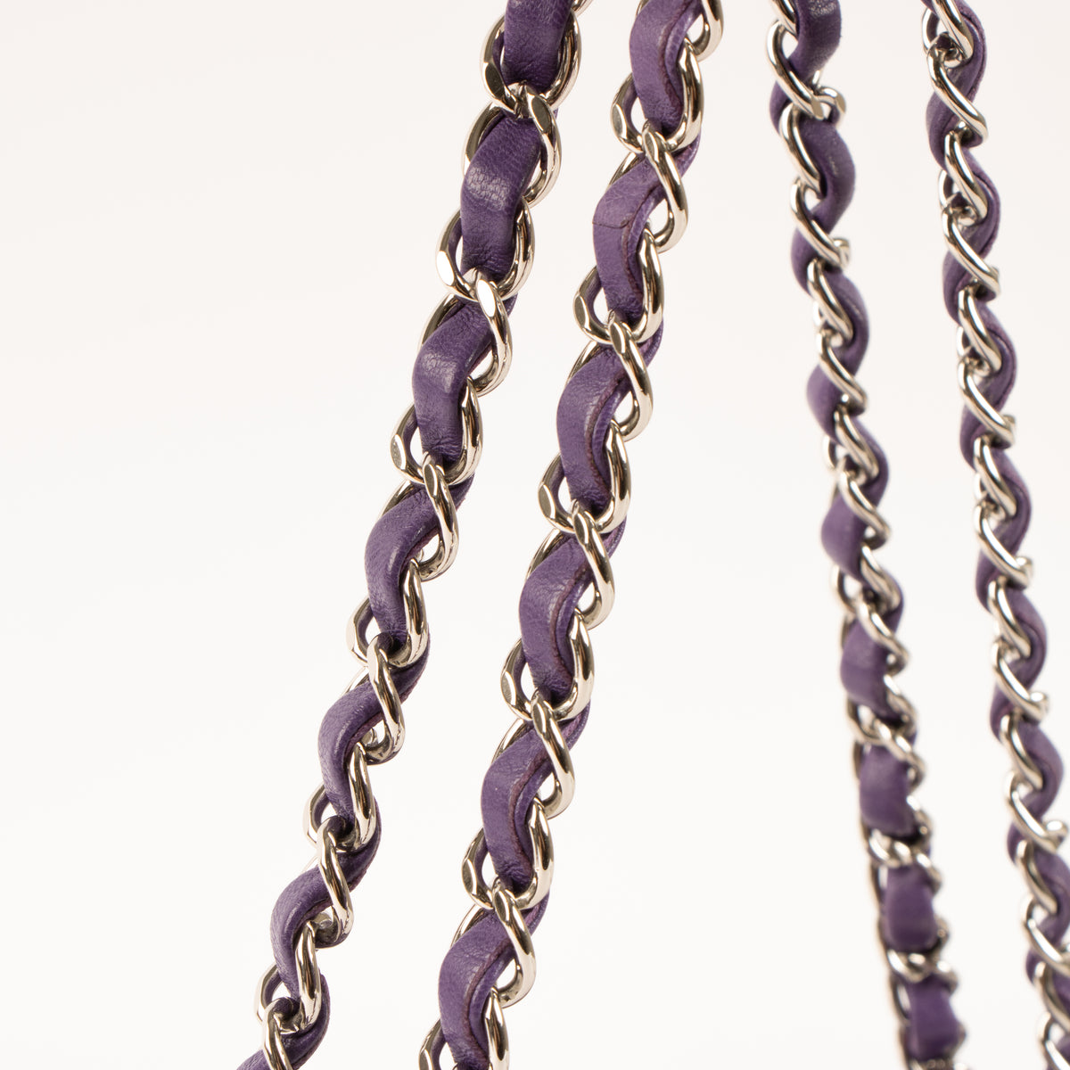 Shop this authentic luxury Chanel Purple Lambskin Medium Classic 11.12 Handbag Pre-Loved on Labellov.com