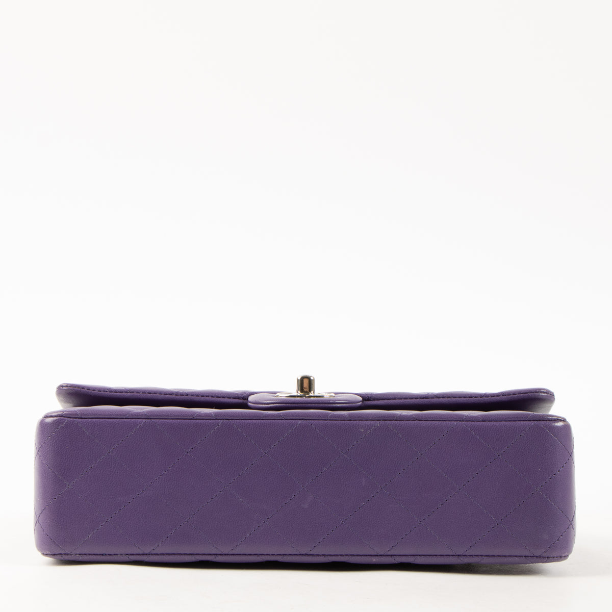 Shop this authentic luxury Chanel Purple Lambskin Medium Classic 11.12 Handbag Pre-Loved on Labellov.com