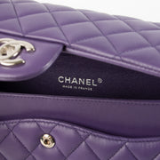 Shop this authentic luxury Chanel Purple Lambskin Medium Classic 11.12 Handbag Pre-Loved on Labellov.com