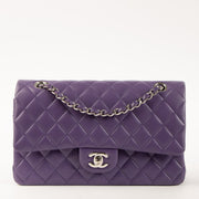 Shop this authentic luxury Chanel Purple Lambskin Medium Classic 11.12 Handbag Pre-Loved on Labellov.com